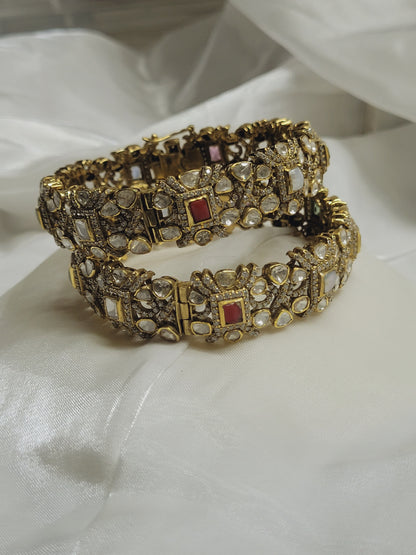 Handcrafted gold gemstone bangles, traditional Indian bridal jewellery set with detailed stone work and elegant finish