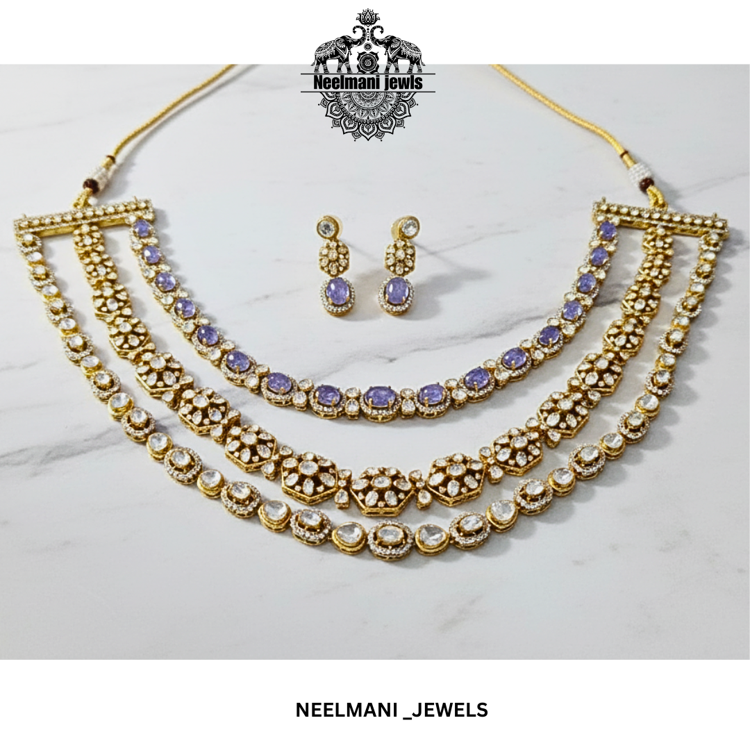 Necklace and earrings set with purple stones on a marble background, branded as Neelmani Jewels.