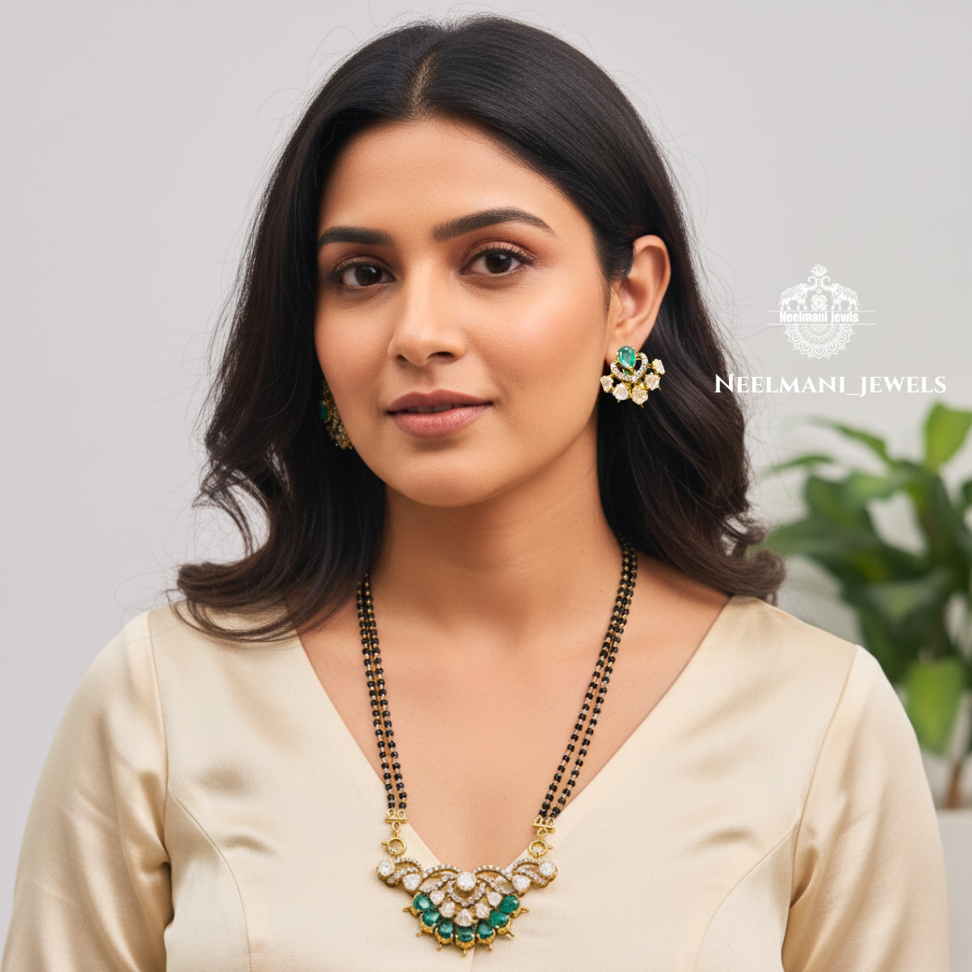 Woman wearing a mangal sutra  and earrings with Neelmani Jewels branding.