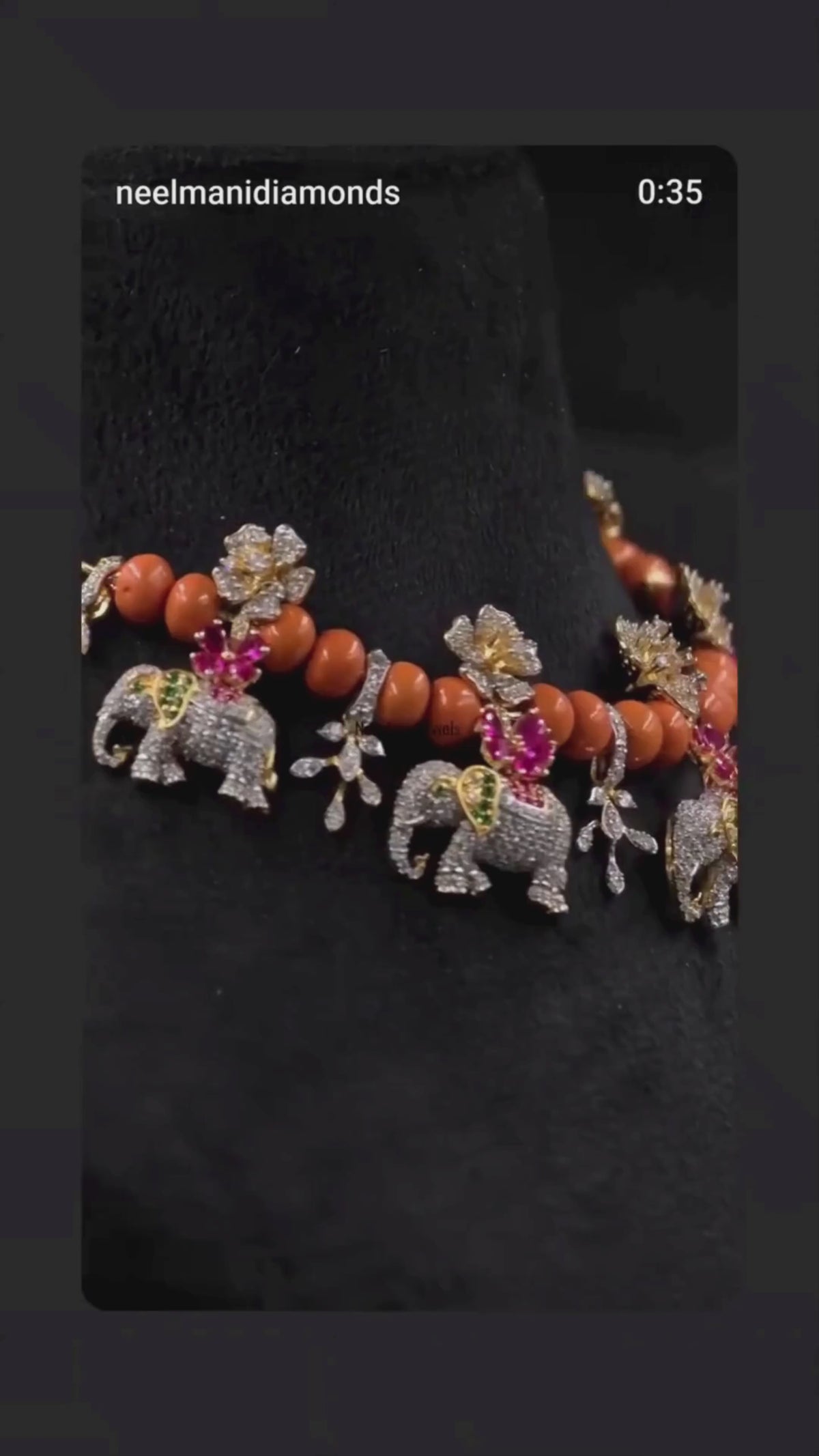 Statement ethnic jewellery with elephant motifs, coral-orange beads and sparkling floral designs