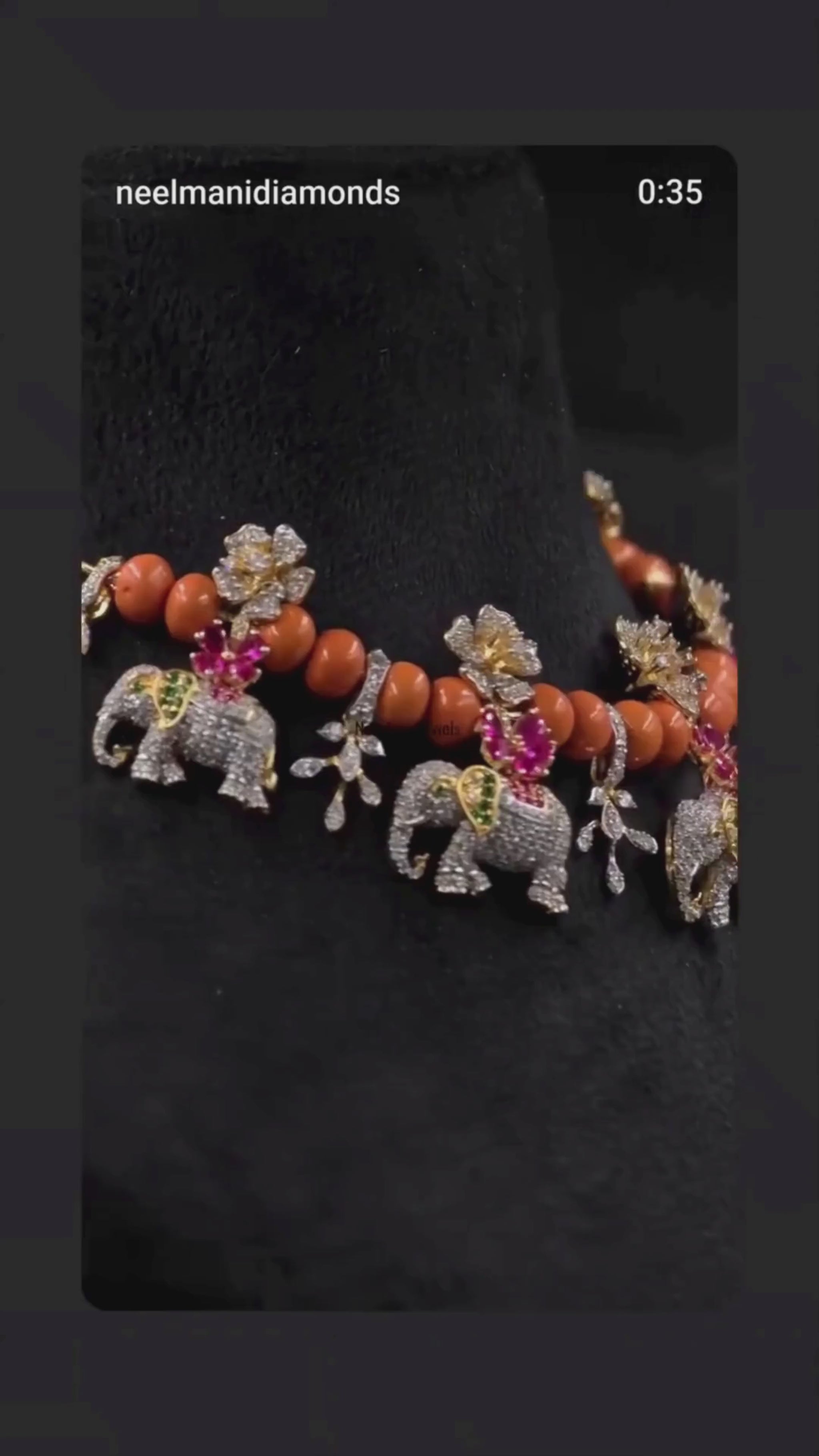 Statement ethnic jewellery with elephant motifs, coral-orange beads and sparkling floral designs